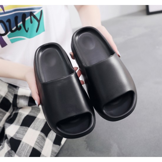 Thick-soled, poop-feel-like, EVA slippers for men and women, coconut sandals with the same Yeezy and Kanye West style.