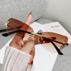 New fashionable rimless cat-eye sunglasses for women, high-end, personalized street style glasses.