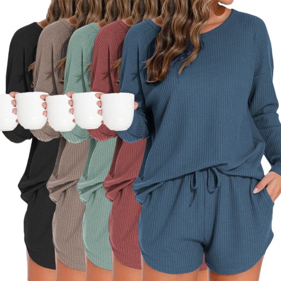 Waffle knit women's pajama set with long-sleeved top and short pants for a casual outfit that can be worn outside