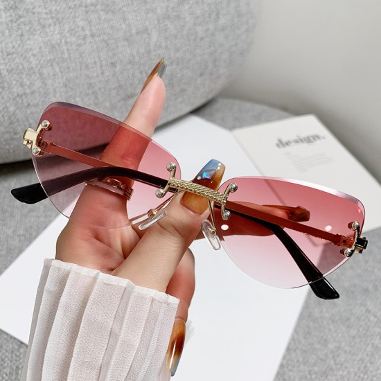 New fashionable rimless cat-eye sunglasses for women, high-end, personalized street style glasses.