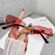 New fashionable rimless cat-eye sunglasses for women, high-end, personalized street style glasses.